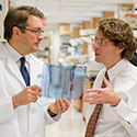 two scientists talking