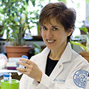 Dr. Salmon in lab headshot