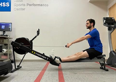 photo of aaron karp straighten legs