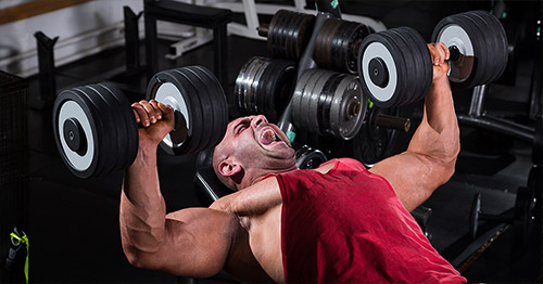 Weightlifter doing presses.