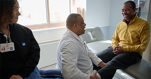 HSS hip replacement patient Robert Woodbine at a post-surgical follow-up appointment.