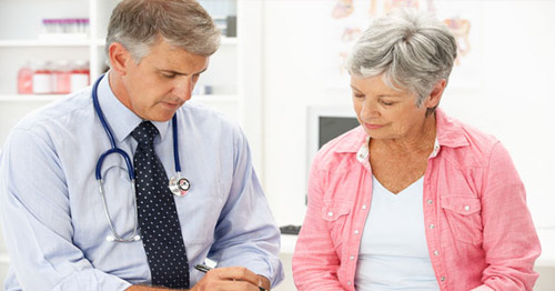A doctor consulting with a patient.