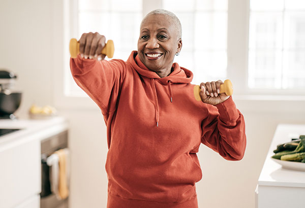 Woman working out with dumbbells