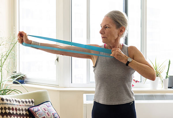 Woman using a workout band