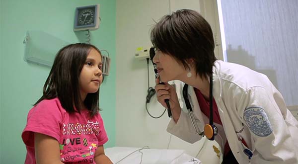 child getting eyes checked