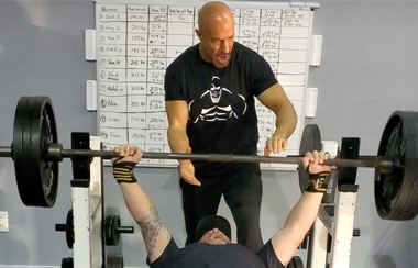 Frank, HSS patient, lifting weights